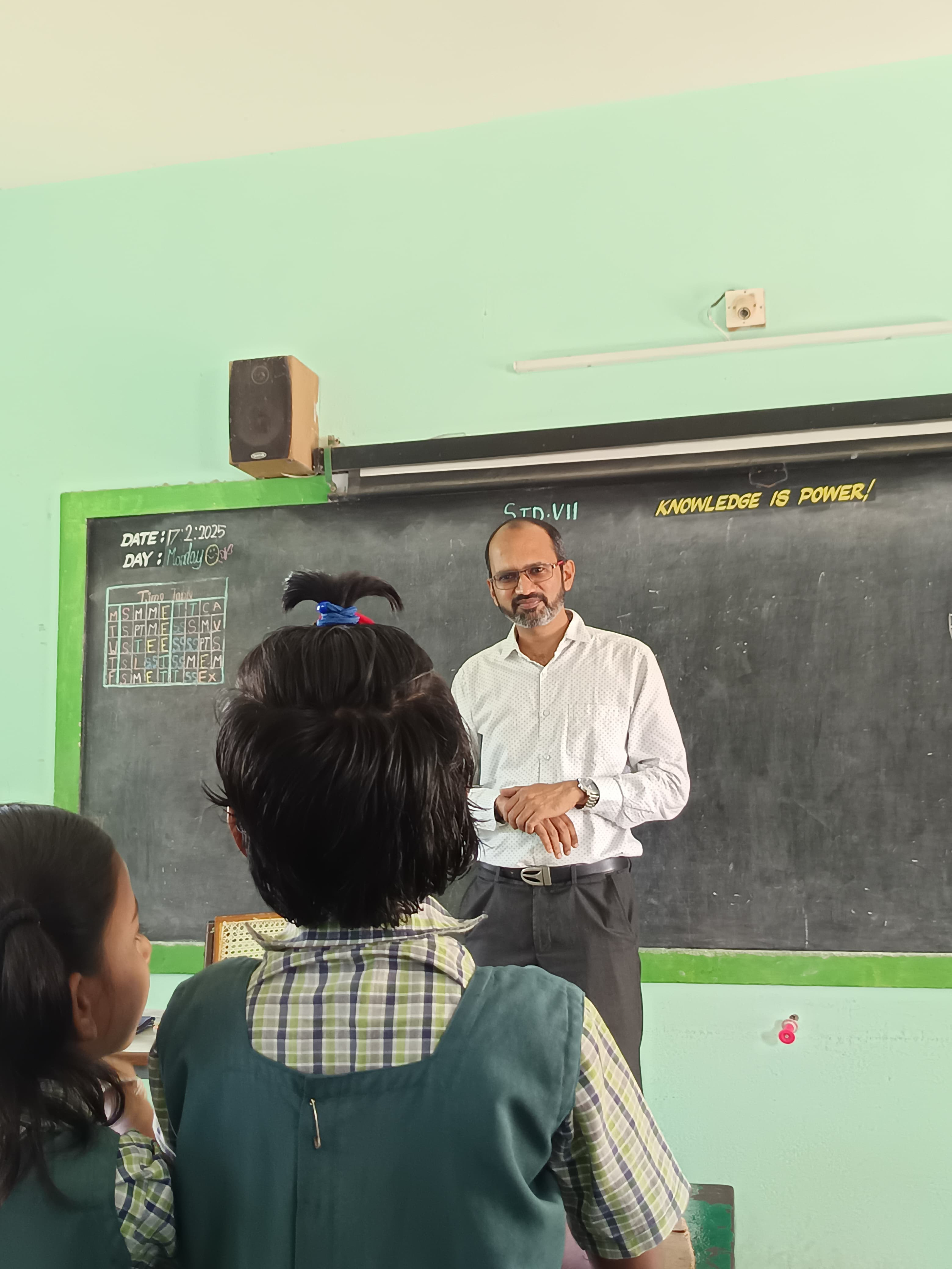 Prem Kumar Gokuladasan teaching in a classroom
